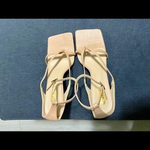 EGO nude and black heeled sandals